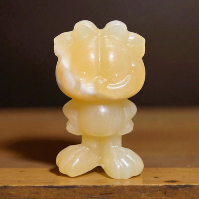 Orange Calcite Lasagna Lover Character Carving